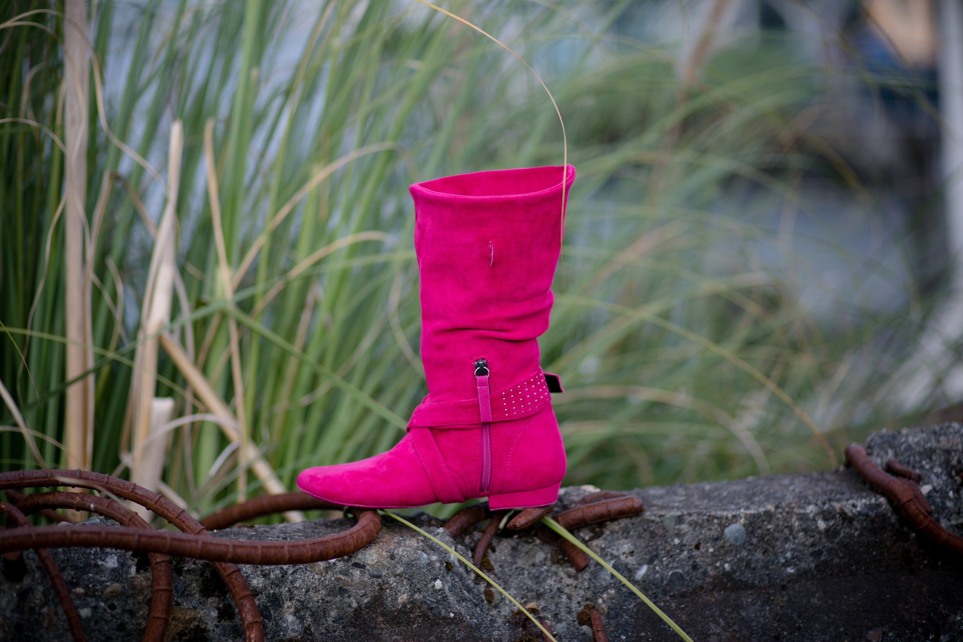 Aurora dance boots fuchsia folded up inside angle with zipper and strap