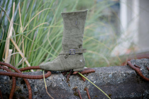Aurora dance boots dark/olive green folded up, outside angle with MLF logo and strap