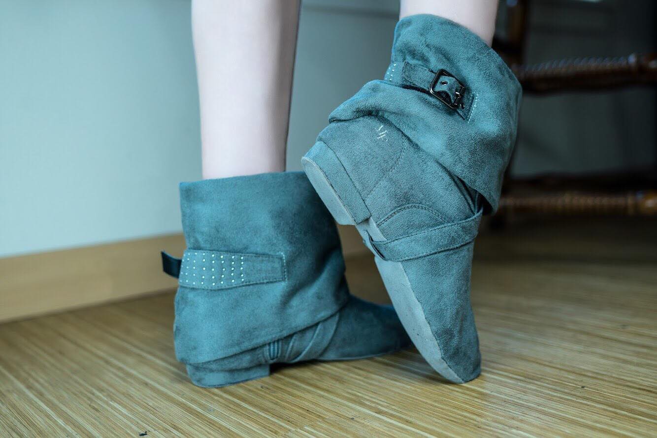 Aurora dance boots grey pair folded down against wooden floor, logo