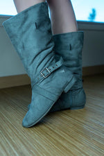 Aurora dance boots grey pair folded up against wooden floor