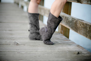 Aurora dance boots dark grey charcoal pair folded up, wooden dock background